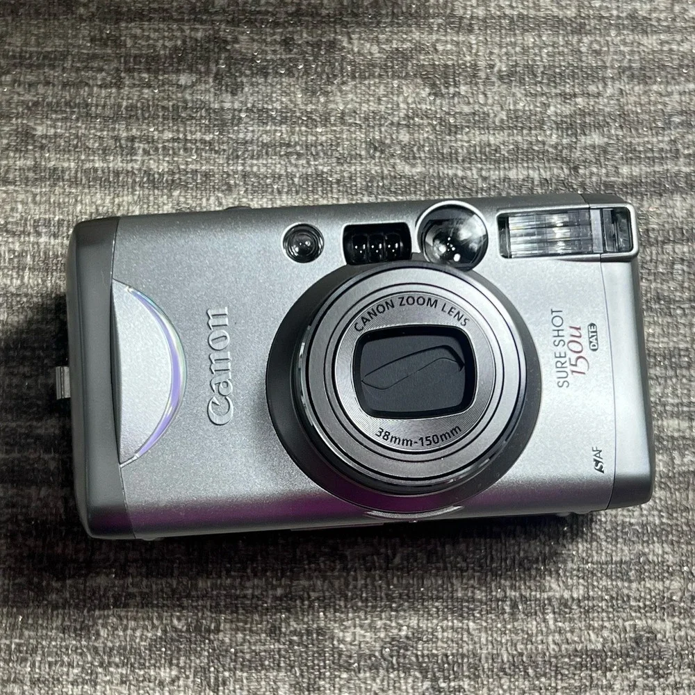 Vintage Canon Sure Shot 150u 35mm Film Camera 38-150mm Zoom Silver Box Manual